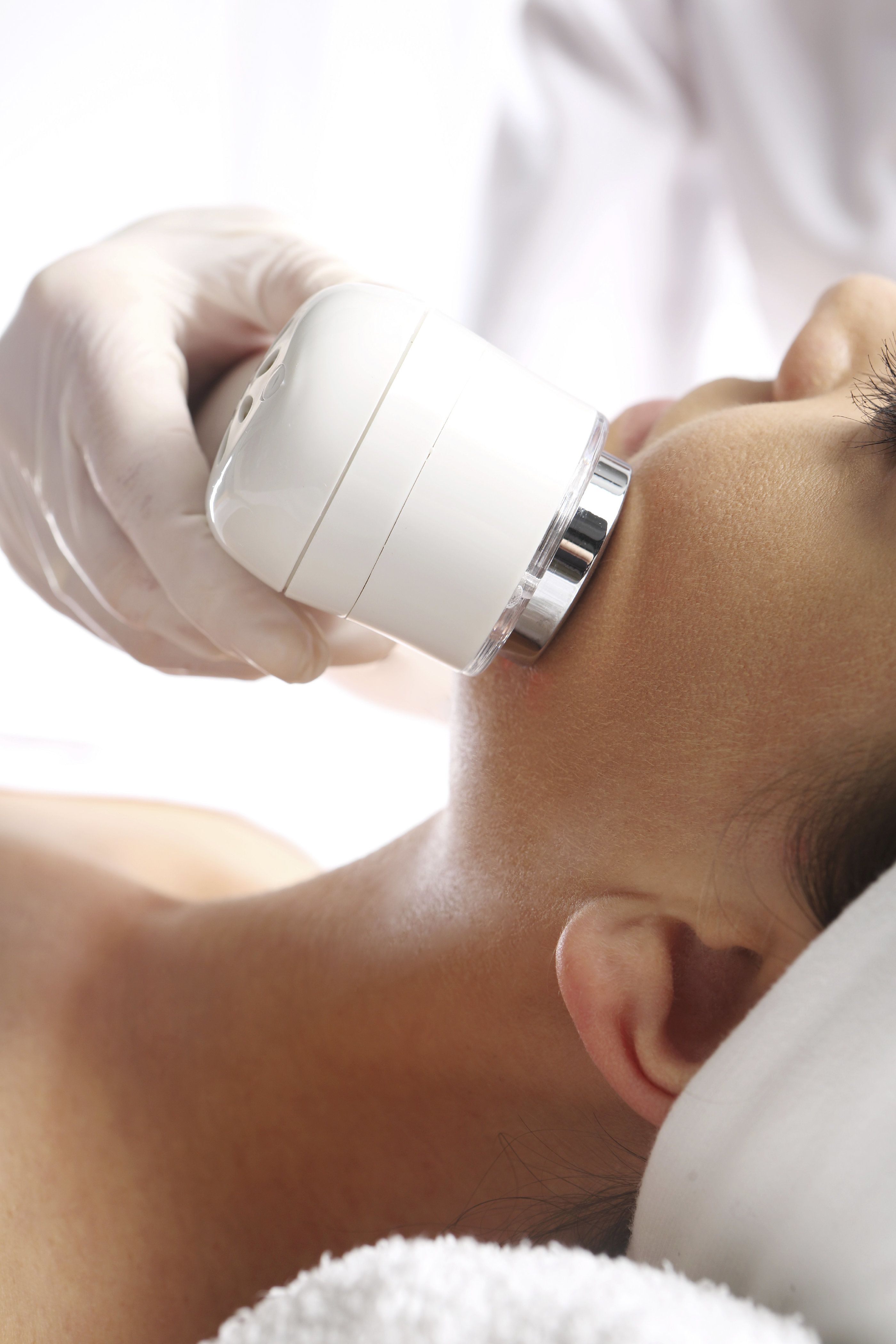 Woman undergoing microdermabrasion