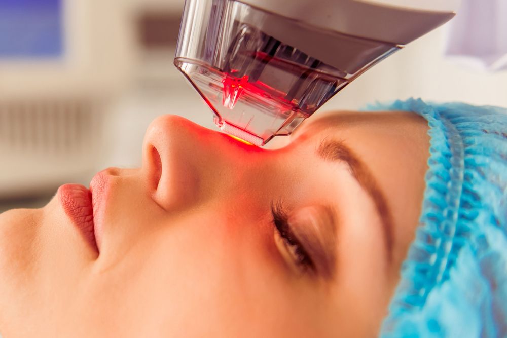 Woman undergoing photofacial treatment