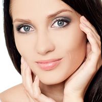 A brunette woman with blue eyes